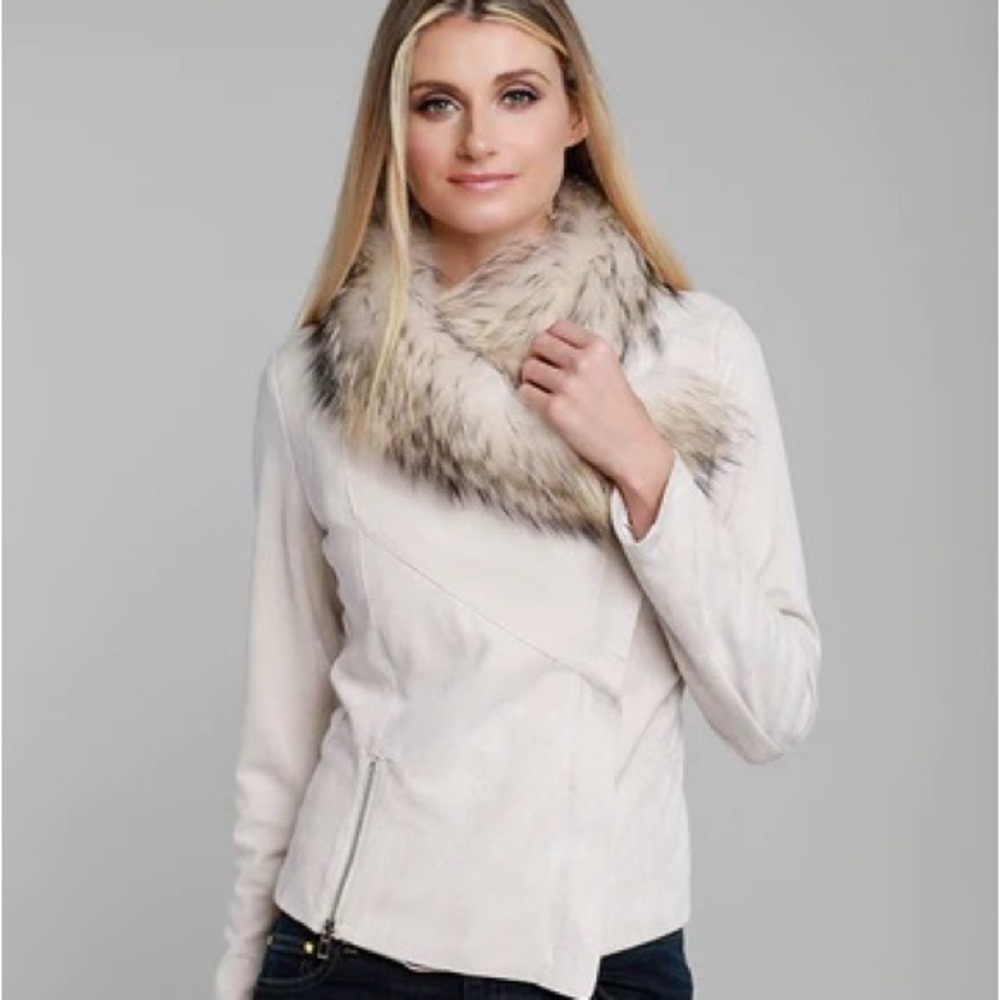 DOLCE CABO zip jacket. Detachable raccoon fur collar like new.
